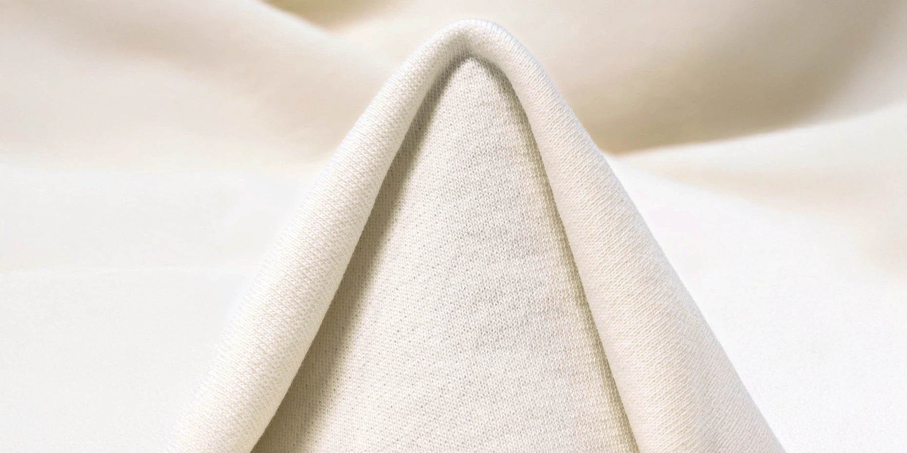 Premium heavyweight hoodie in natural raw – close-up of the smooth, durable cotton exterior by CUKIDRIP