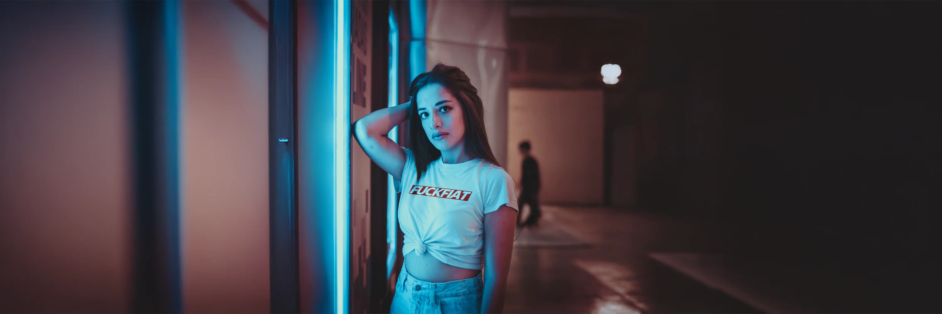 Premium streetwear model wearing white F*#k Fiat T-Shirt | High-impact crypto culture design by CUKIDRIP